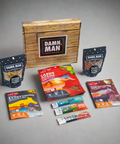 Adventure Tour Nut and Meat Gift Box with premium snacks from Damn, Man Snacks, including Thai Chili and Carne Asada flavors.