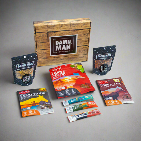 Adventure Tour Nut and Meat Gift Box with premium snacks from Damn, Man Snacks, including Thai Chili and Carne Asada flavors.