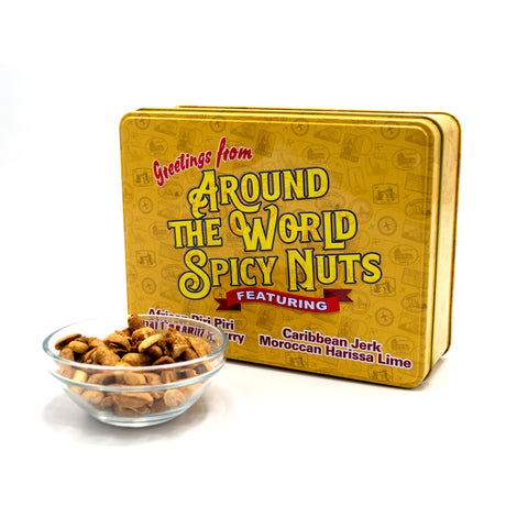 Around the World Spicy Nuts Sampler Tin with global flavors next to a bowl of gourmet nuts