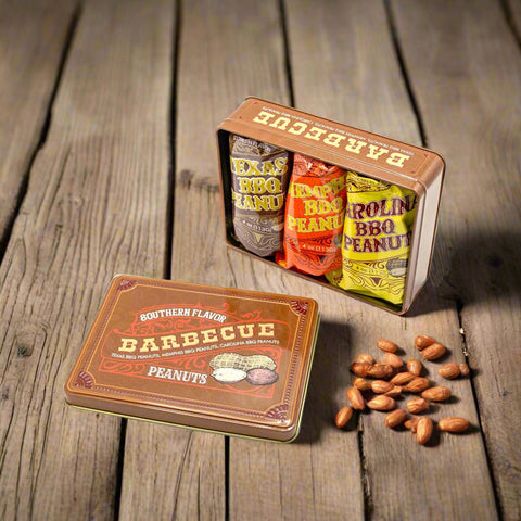 Southern BBQ Peanuts Men's Gift Tin with Texas, Memphis, and Carolina flavored 4 oz. bags on rustic wood table