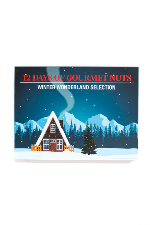 12 Days of Gourmet Nuts Winter Wonderland Selection après ski nut calendar with snow-covered cabin and mountains