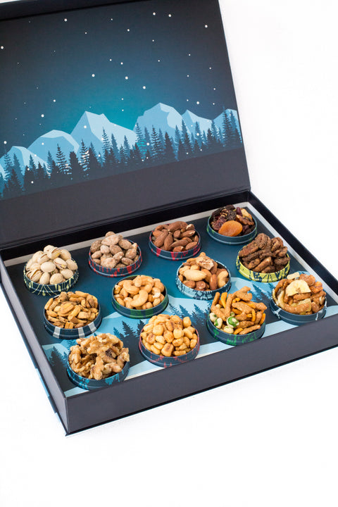 Open Tins of 12 Gourmet Nuts in Winter Wonderland Advent Calendar photo