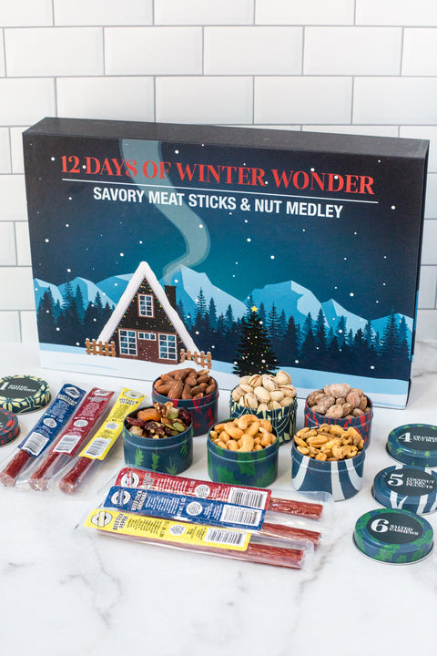 12 Days of Winter Wonder - Savory Meat Sticks & Nut Medley gift set with assorted flavored nuts and meat sticks in holiday packaging.