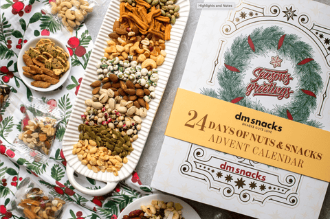 "24 Days of Nuts & Snacks Holiday Advent Calendar with assorted nuts and snacks on festive table"