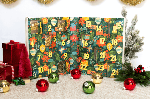 24 Days of Nuts & Snacks Holiday Advent Calendar with festive Christmas decorations