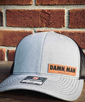 Damn, Man Grey Trucker Hat.